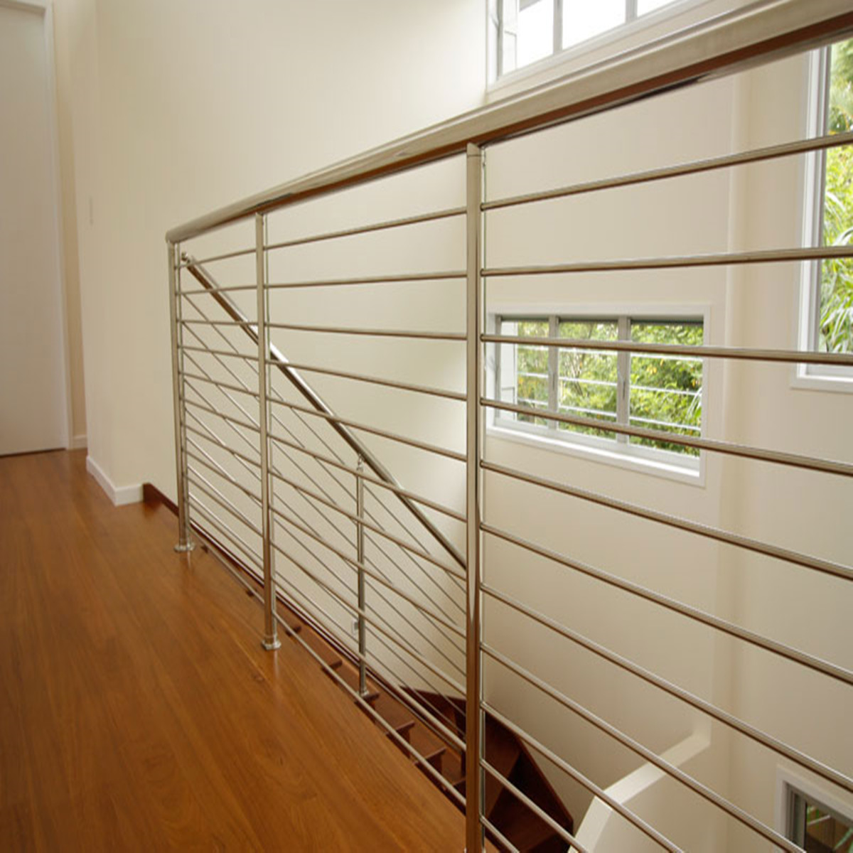 Quality Stainless steel stair balustrade with wooden handrail solid rod design for sale