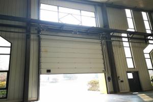 Quality Outside Galvanized Steel Frame Industrial  Sectional Doors With High frequency Motor for sale