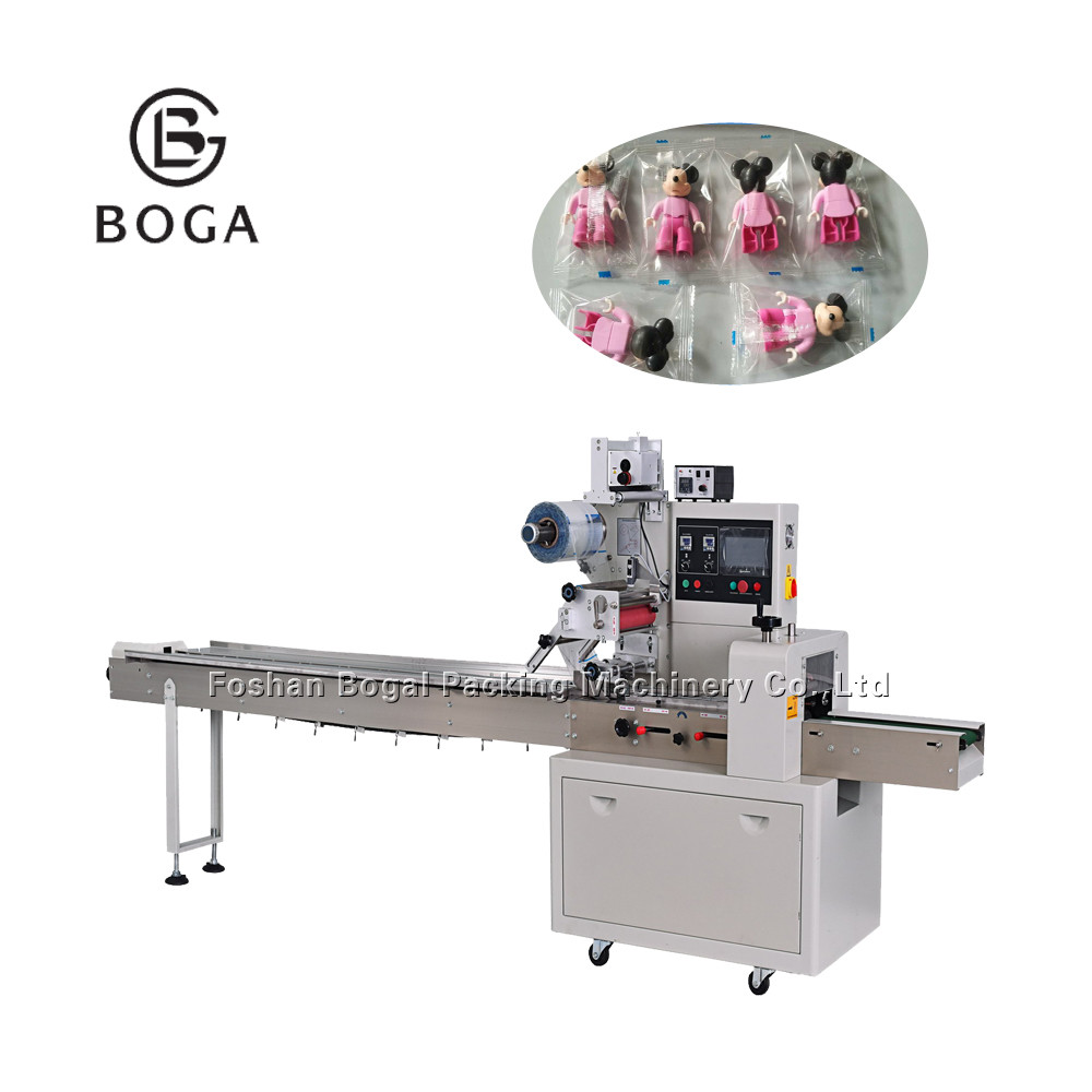 Quality Flow Wrap Packaging Machine Stationary Application Toys Packaging Engineer Provide for sale