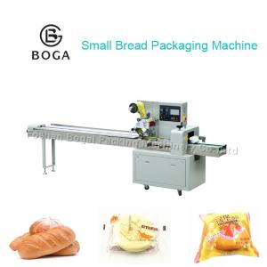 Quality Carbon Steel Bread Packaging Machine film bag Sealing and cutting Cupcake packing machine for sale