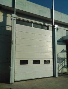 Quality Steel Sandwich Construction Industrial Sectional Doors Roller Exterior 24db Sound Insulation for sale