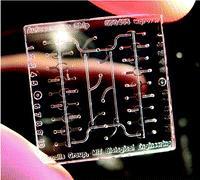 FEP/PFA films for chemically-inert microfluidic valves and pumps
