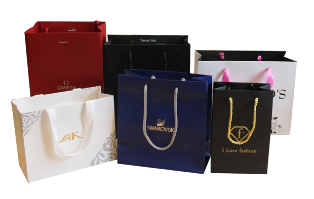 Quality Custom Fancy Logo Printed Shopping Paper Carrier Bags for sale