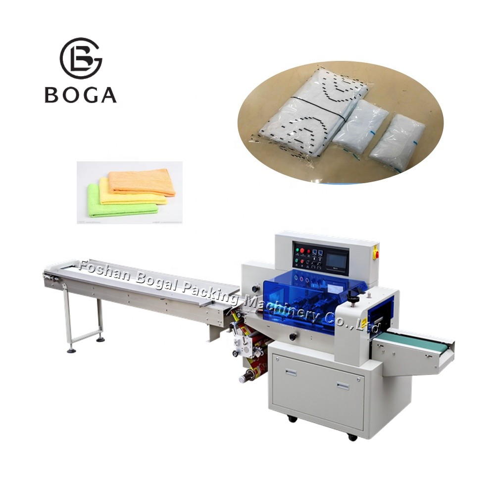 Quality Rotary Daily Necessities Pillow Packaging Machine For Steel Ball Dishcloth for sale