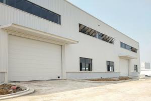 Quality Automatic Industrial Sectional Garage Doors With PVC Window And Sandwich Panel Steel for sale