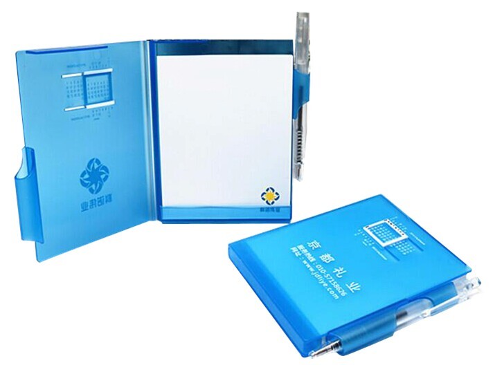 memo book with calendar and pen in the holder
