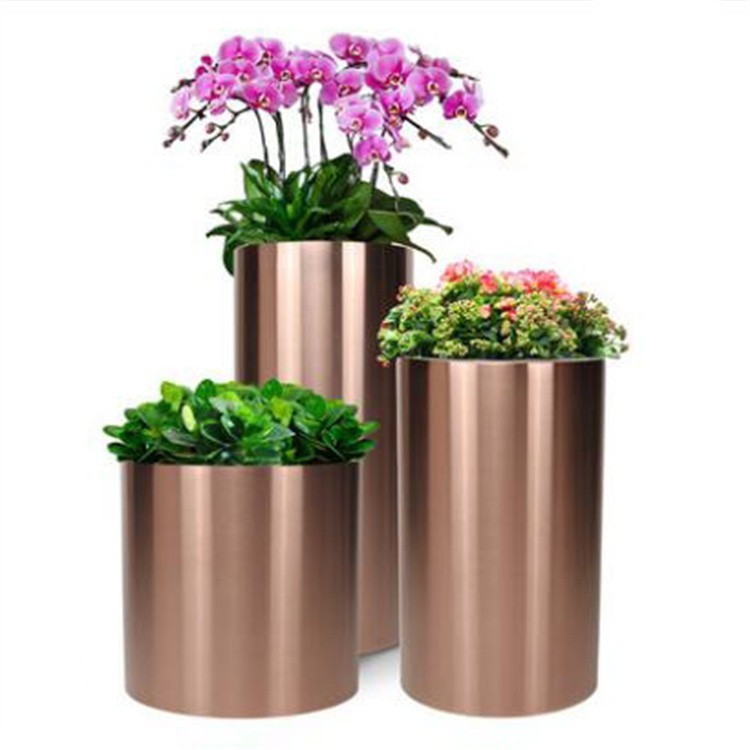 Quality Sus 304 Mirror Round Metal Flower Pots Metal Flower Planter For Park Mall for sale