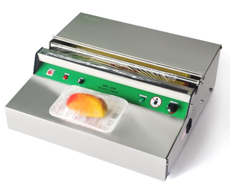 Quality Stainless Steel Electric PVC Cling Film Wrapping Machine / Food Tray Sealing Machine for sale