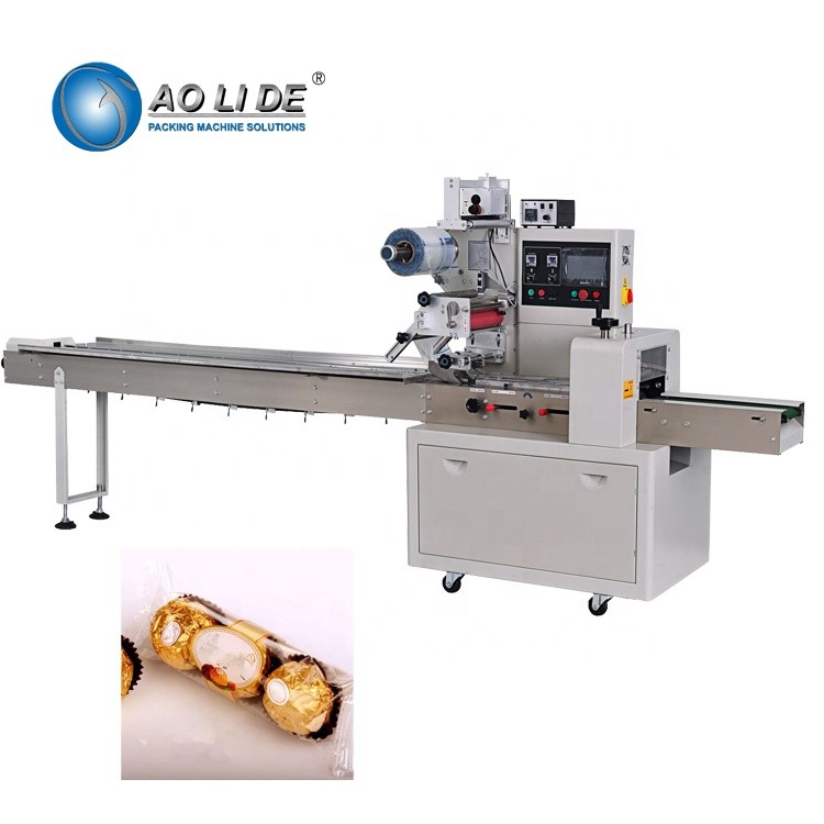 Quality 220V Horizontal Flow Wrap Packing Machine Candy Chocolate Bar Packing for sale
