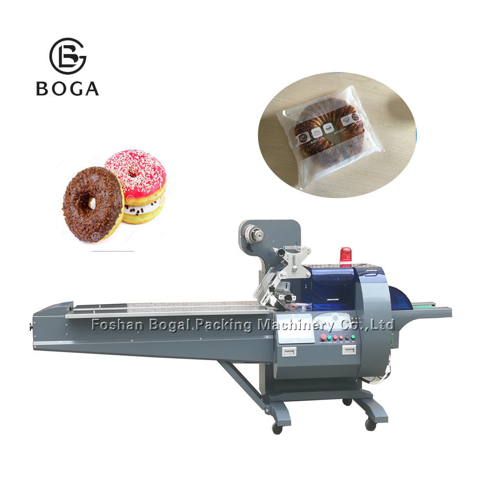 Quality OEM factory price food application small doughnuts cakes packing machine looking for dealer in Malaysia for sale