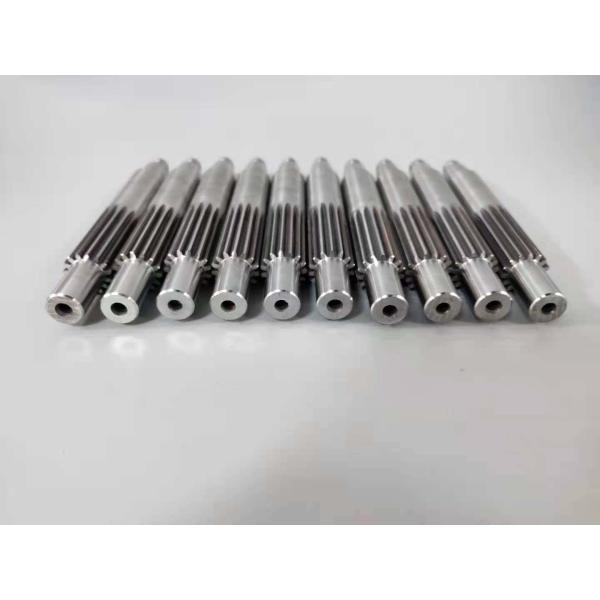 Close-up view of Stavax mold inserts with precision threading