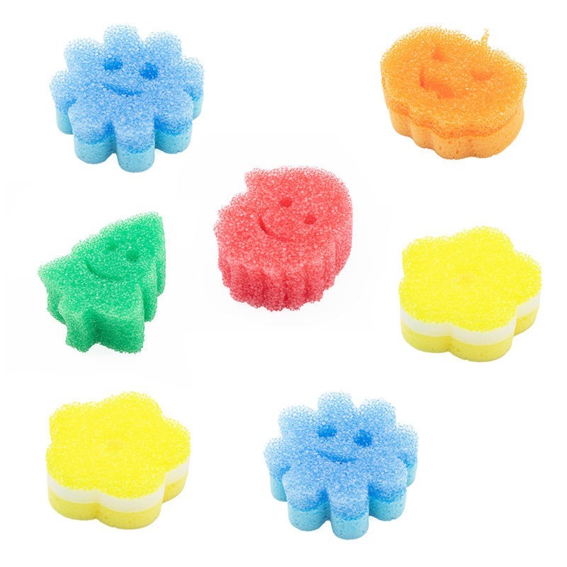 Scrub sponge in use on various kitchen surfaces