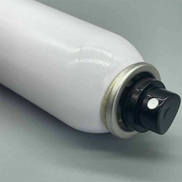 Close-up detail of aerosol mist pump nozzle and components