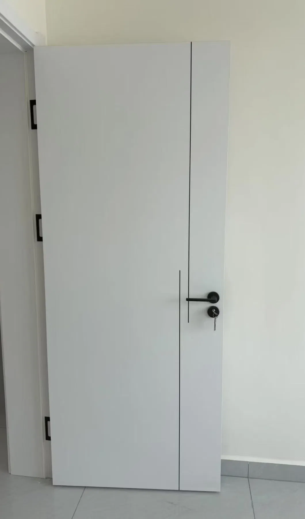 Complete solid wood door set including leaf, frame, architrave, lock, handles, and hinges