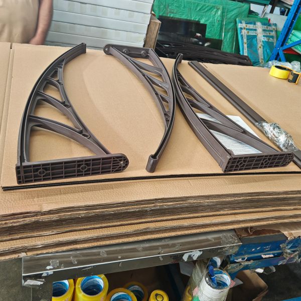 Wall-mounted Polycarbonate canopy built for window awning projects delivering effective sunshade and sturdy construction