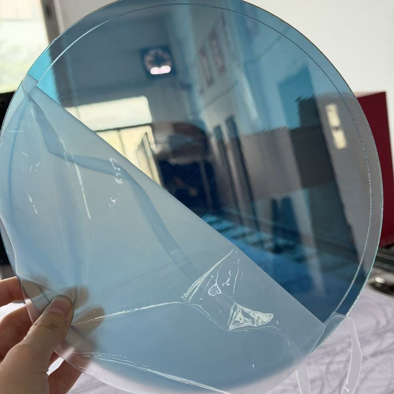 Close-up view of mirror surface and edge quality