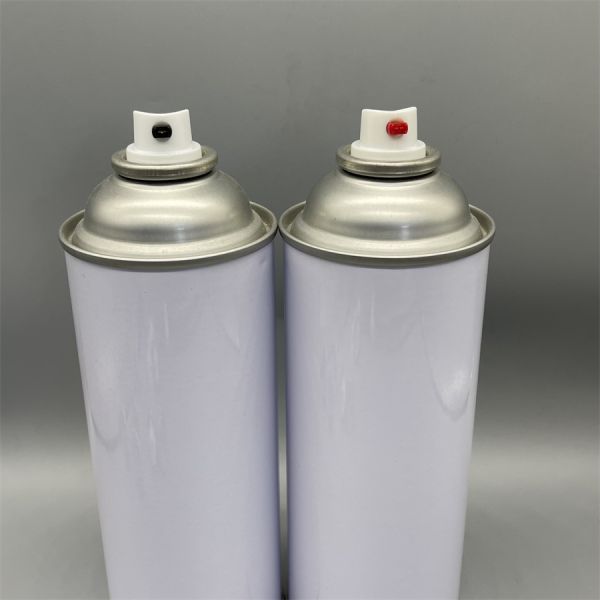 Female paint valve shown with industrial paint canister