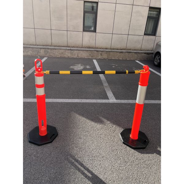 Durable Spring Post with weather resistant flexible polymer material and highly reflective film for effective traffic control and safety