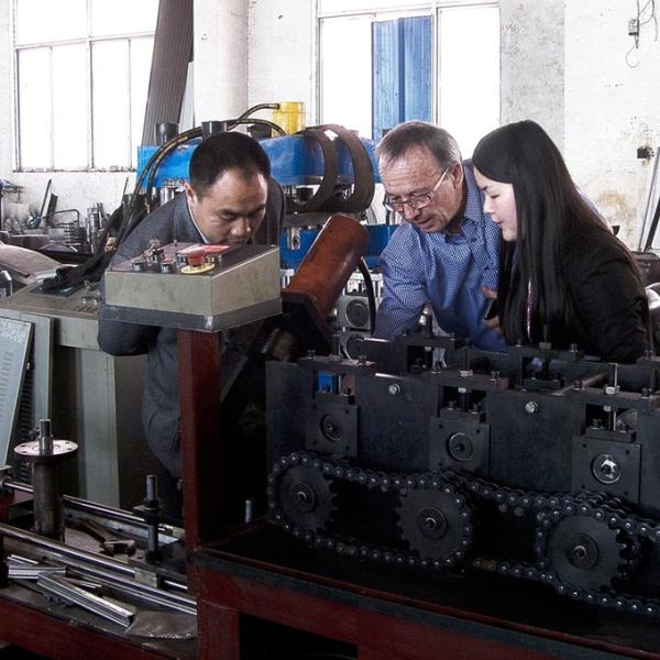 Automatically Punching PU Shutter Door Roll Forming Machine Flat Injection 24 * 0.6 * 0.9m