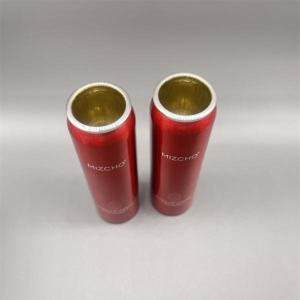 Close-up view of aluminum aerosol canister showing detailed construction
