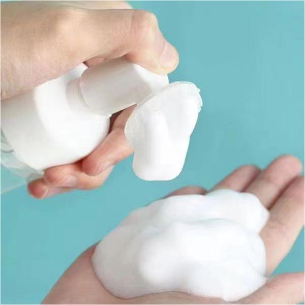 Plastic Silicone Brush Foam Bottle with Hybrid Functionality for Gentle Massaging and Sanitary Cosmetic Application