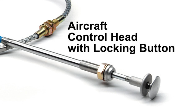 Close-up of aircraft control cable head with stainless steel locking button