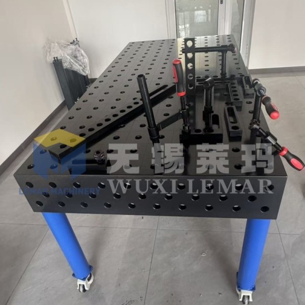 D28 welding table side view showing modular hole system