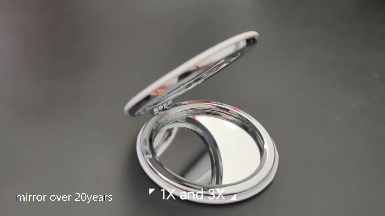 Mini folding acrylic makeup mirror showing compact design and double-sided functionality