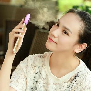 China Mini Mobile Phone Mist Moisturizing Beauty Instrument Portable Water Replenishment Mini Humidifier Facial Water Spray on sale