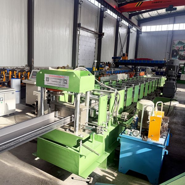 Close-up view of roller forming stations and cutting mechanism