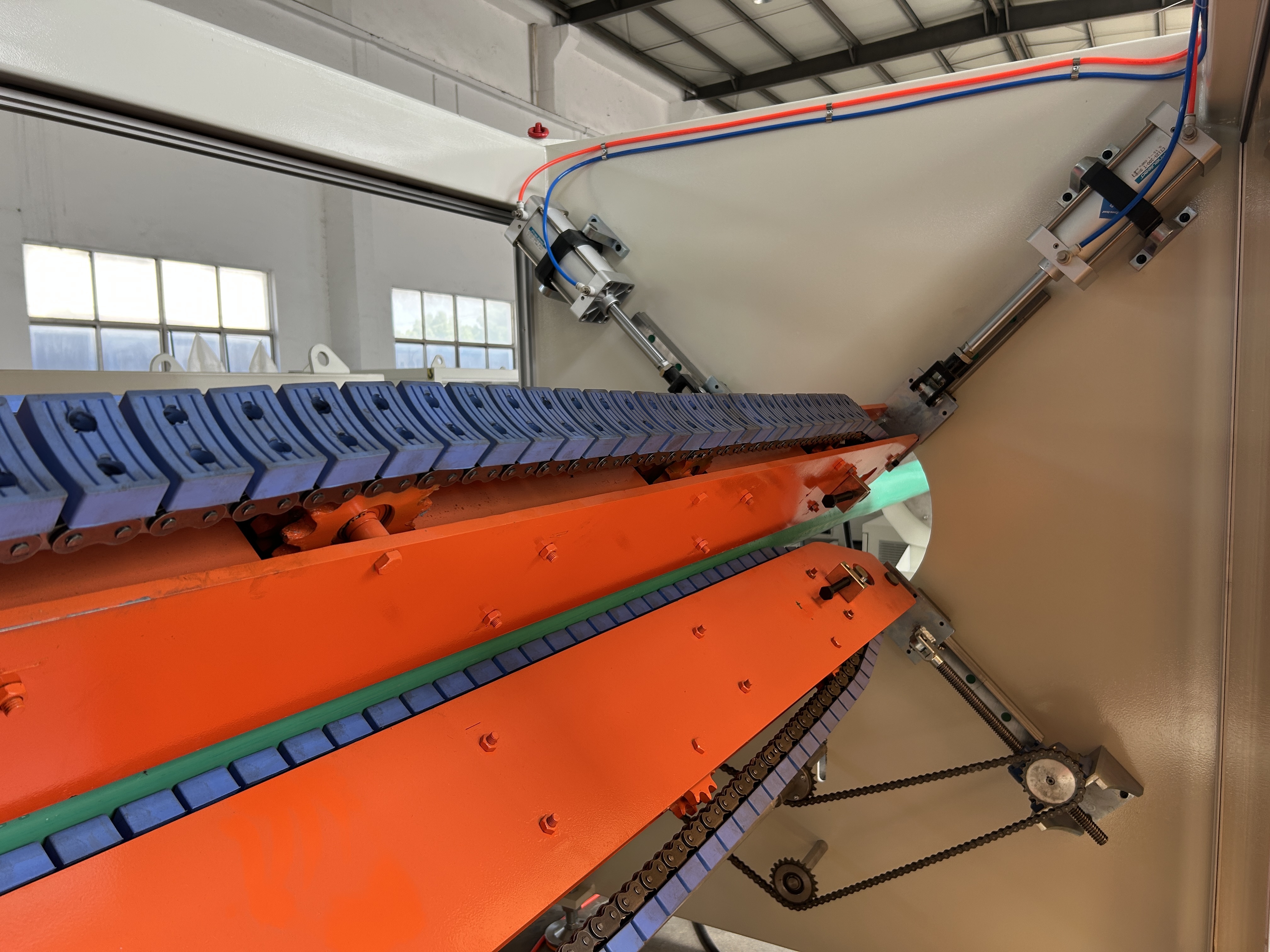 Close-up view of extrusion system components and mechanisms