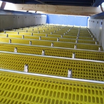 Close-up view of red polyurethane flip flop screen mesh with square holes