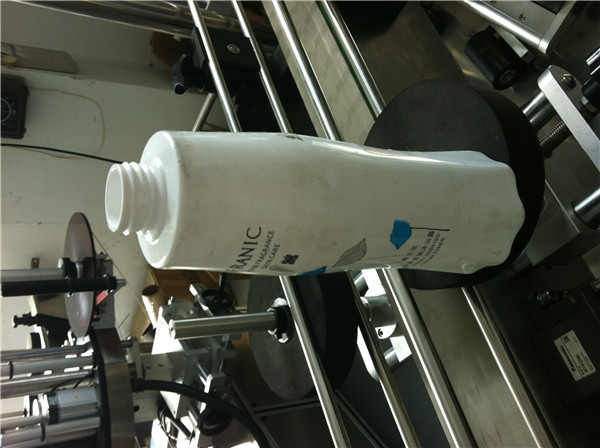 Orientated Wrap-around Labeling System For Round Bottle / Container / Jar