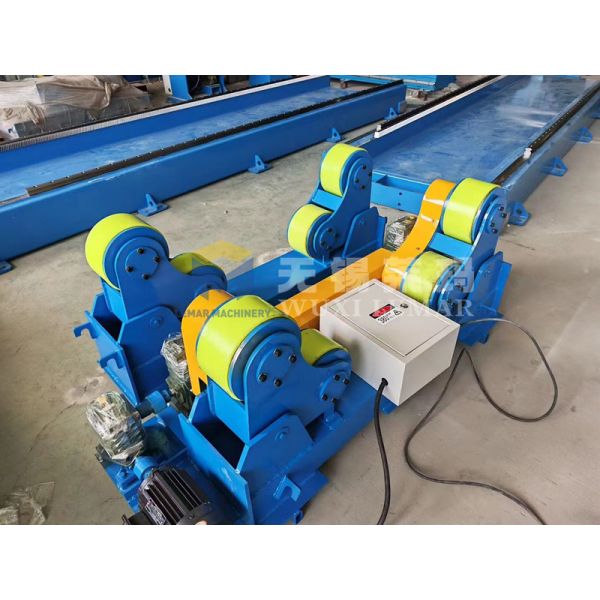 Close-up view of welding turning rolls mechanism