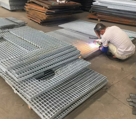 Hot-dipped galvanized steel grating installation example showing durable walkway surface