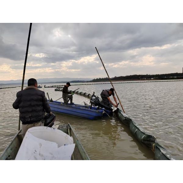 Controlled Containment Area Sedimentation Control with Silt Screen Made of Rubber and Foam Filled BOOM Material