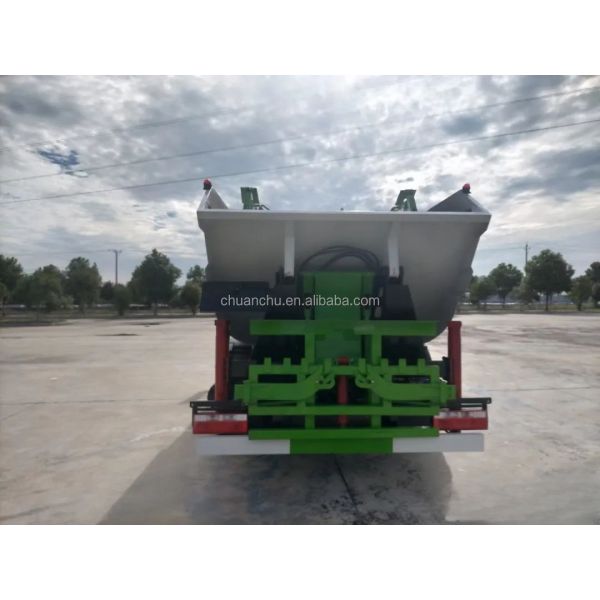 Pure electric garbage compactor truck charging port