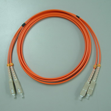 Multimode orange color PVC out jacket Good Repeatability Fibre Optic Patch Cable