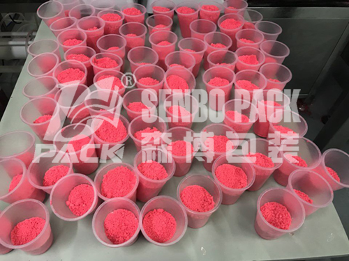 Bath salt plastic cup weighing and filling machine