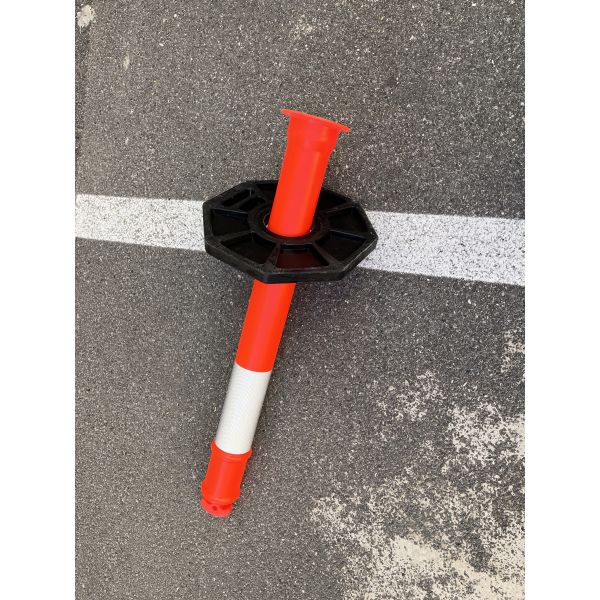 Durable Spring Post with weather resistant flexible polymer material and highly reflective film for effective traffic control and safety