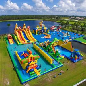 Quality Land Inflatable Water Park With Big Slides And Floating Toys for sale