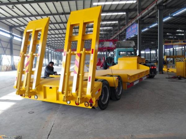 Buy Economic 2 Axles 40 Tons Low Bed Semi Trailer With Heavdy Duty Steel Spring Ramps at wholesale prices