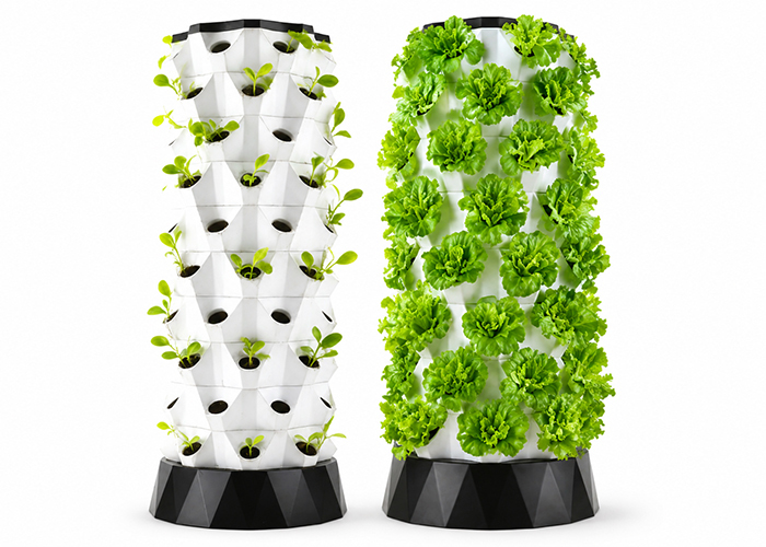 Modular vertical hydroponic tower system showing spiral design and plant arrangement