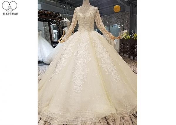 Buy Ivory Long Sleeve High Neck Bridal Gowns Backless Sweep Train Special Beaded Net at wholesale prices