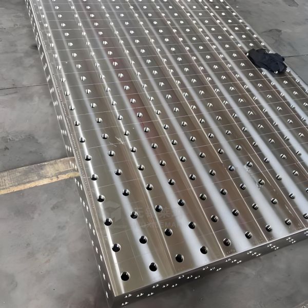 Factory precision testing of welding table using measurement instruments