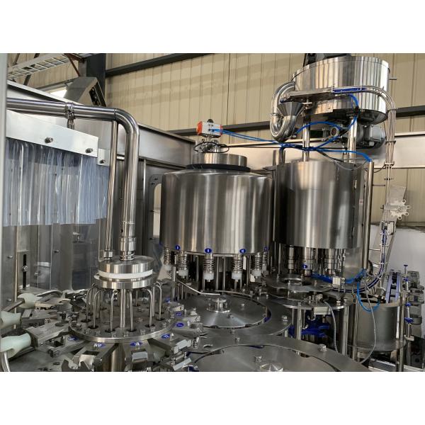 CE ISO Certification Automatic 0.2-2L Rotary Water Bottle Filling Machine For Non-Carbonated Filling