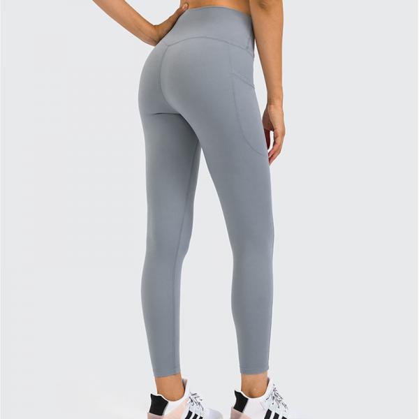 Buy Hip Lifting High Waisted Tights Pants Nylon Women's Yoga Pants With Side Pockets at wholesale prices