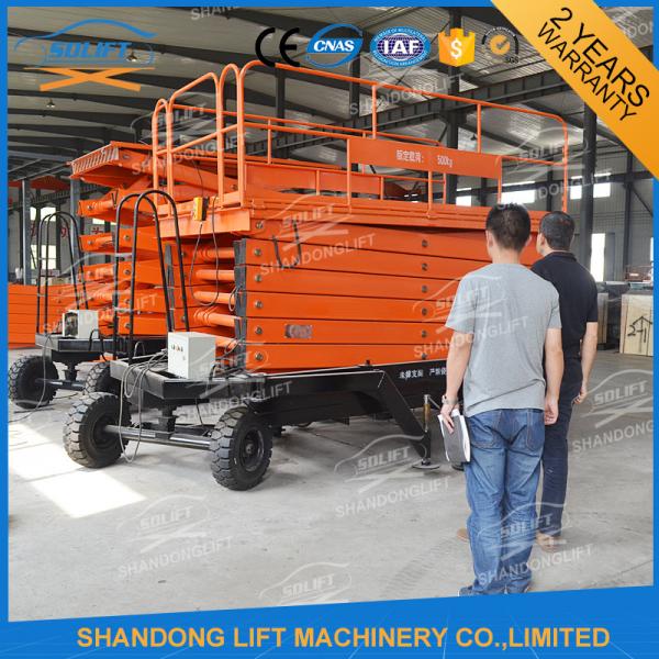 Buy Hydraulic Electric Mobile Platform Lift Mobile Scissor Lift Table Pull type at wholesale prices