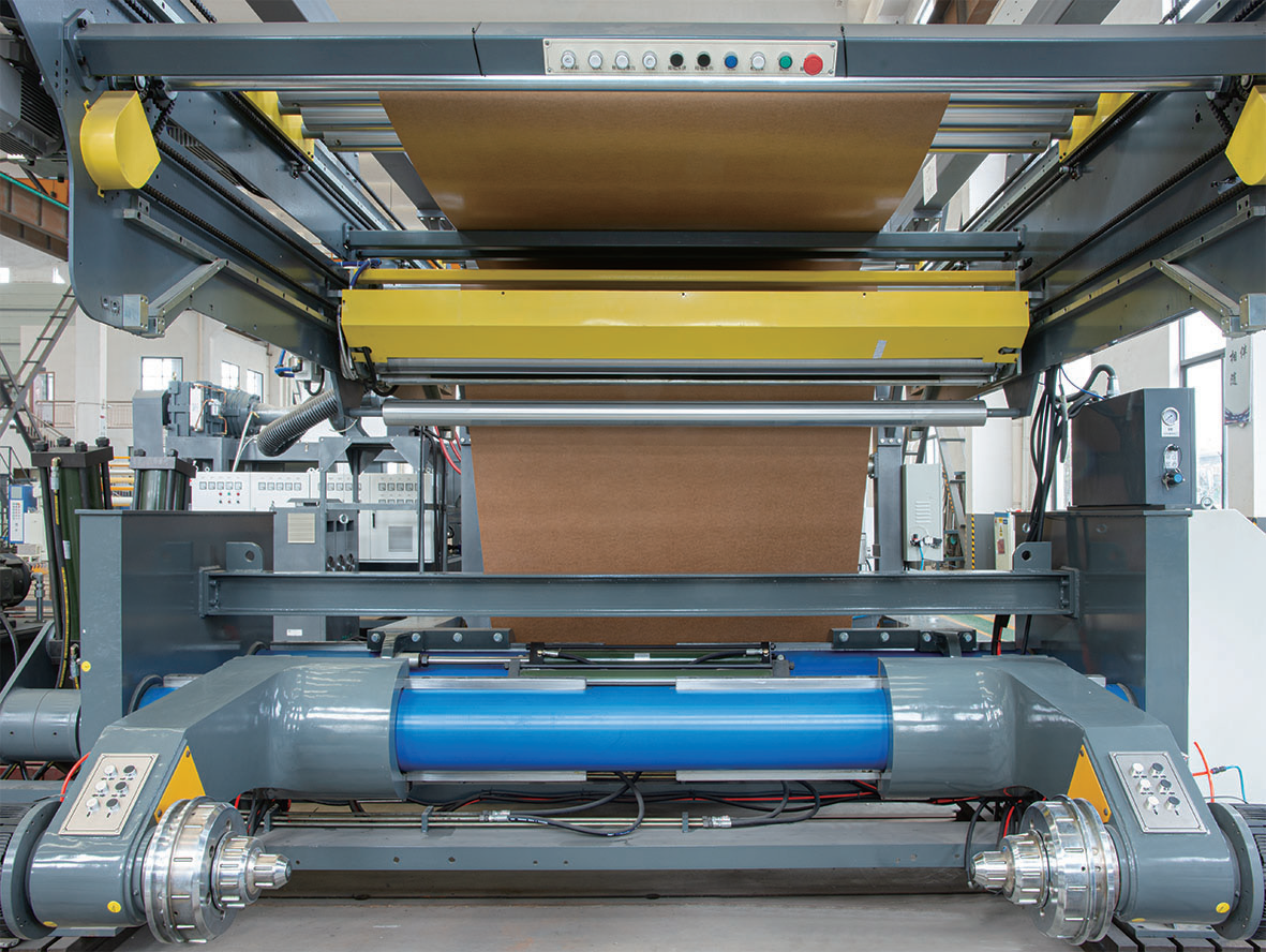 Extrusion laminating machine roller system
