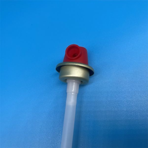 Fire extinguisher valve red button actuator in operation